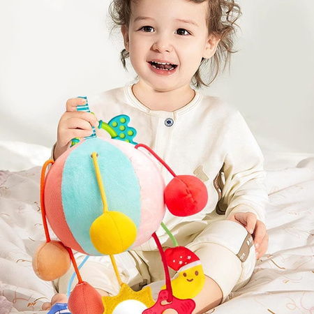 Piłka sensoryczna piłeczka zawieszka do wózka piszczki lusterko gryzak